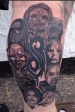 Black and Grey Slipknot full band calf tattoo